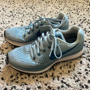 Light blue Nike size 7 running shoes
